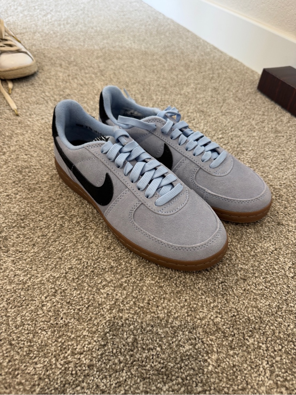 Nike Women’s Light Blue Suede Sneakers